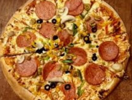 طريقة عمل بيتزا الخضار بالروست بيف