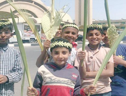 الأقباط يحتفلون بـ«أحد السعف»